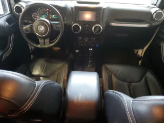 2015 Jeep Wrangler Unlimited Altitude с VIN 1C4HJWEG3FL559879, выставлен на аукционе Copart как лот 61054505 с пробегом 100 123 миль миль и На запчасти • Non repairable. История ставок и продаж доступна на DreamBid. Изображение 8.