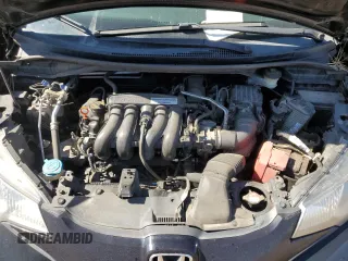 2015 Honda Fit LX with VIN 3HGGK5H55FM717684, listed as a Copart auction lot 61550505 with 146,646 mi miles and Salvage title. Bid and sale history available at DreamBid. Image 11.