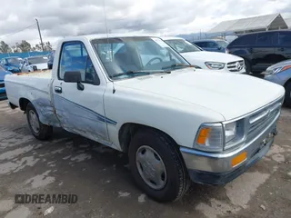 1992 Toyota Pickup DLX z VIN 4TARN81PXNZ004395, wystawiony jako IAAI lot #41729264 z przebiegiem 137 289 mil mil oraz . Historia ofert i sprzedaży dostępna na DreamBid. Obrazek 1.