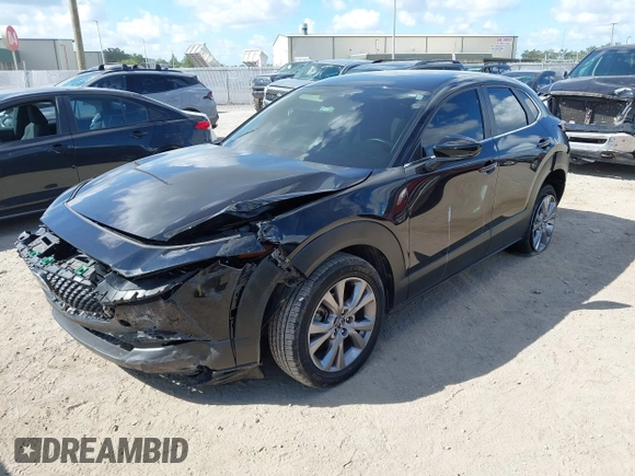 2021 Mazda CX-30 Select z VIN 3MVDMABL1MM251761, wystawiony jako IAAI lot #42267217 z przebiegiem 42 617 mil mil oraz . Historia ofert i sprzedaży dostępna na DreamBid. Obrazek 2.