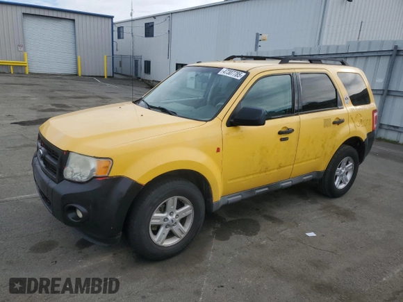 2011 Ford Escape Hybrid с VIN 1FMCU4K37BKB60122, выставлен на аукционе Copart как лот 47307785 с пробегом 448 505 миль миль и Чистый • Clean title. История ставок и продаж доступна на DreamBid. Изображение 1.