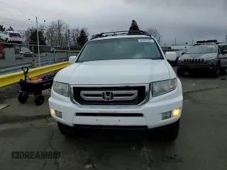 2010 Honda Ridgeline RTL with VIN 5FPYK1F58AB005088, listed as a Copart auction lot 47477975 with 128,538 mi miles and Salvage Title. Bid and sale history available at carsss.com. Image 11.
