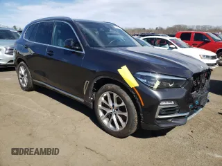 2021 BMW X5 xDrive45e with VIN 5UXTA6C01M9H62393, listed as a Copart auction lot 47083315 with 66,910 mi miles and Salvage title. Bid and sale history available at DreamBid. Image 4.