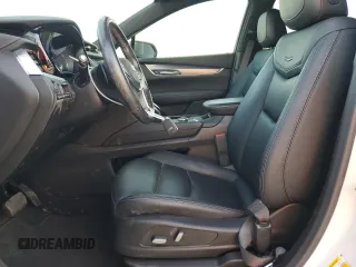 2022 Cadillac XT5 FWD Luxury z VIN 1GYKNAR49NZ118633, wystawiony jako Copart lot #43274175 z przebiegiem 46 946 mil mil oraz Szkoda całkowita • Salvage title. Historia ofert i sprzedaży dostępna na DreamBid. Obrazek 7.
