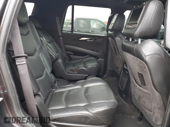 2016 Cadillac Escalade Platinum z VIN 1GYS4DKJ3GR354153, wystawiony jako Copart lot #82494394 z przebiegiem 124 561 mil mil oraz Szkoda całkowita • Salvage title. Historia ofert i sprzedaży dostępna na DreamBid. Obrazek 11.