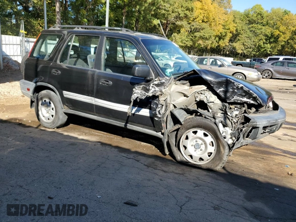 1999 Honda CR-V LX with VIN JHLRD2847XC021888, listed as a Copart auction lot 76556164 with 285,517 mi miles and Salvage Title. Bid and sale history available at carsss.com. Image 4.
