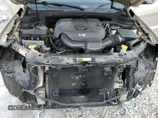 2015 Jeep Grand Cherokee High Altitude with VIN 1C4RJECG4FC669809, listed as a Copart auction lot 88909645 with 115,752 mi miles and Salvage Title. Bid and sale history available at carsss.com. Image 12.