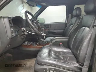 2001 Oldsmobile Bravada z VIN 1GHDT13W212196750, wystawiony jako Copart lot #44019065 z przebiegiem 126 878 mil mil oraz Szkody całkowita. Historia ofert i sprzedaży dostępna na DreamBid. Obrazek 7.