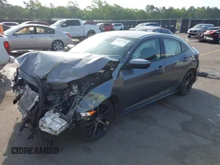 2021 Honda Civic Sport with VIN SHHFK7H44MU217741, listed as a IAAI auction lot 42029373 with 68,572 mi miles and . Bid and sale history available at DreamBid. Image 2.