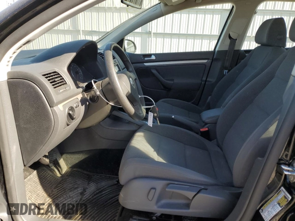 2009 Volkswagen Rabbit S with VIN WVWDA71K59W147903, listed as a Copart auction lot 76706654 with 73,297 mi miles and Salvage title. Bid and sale history available at DreamBid. Image 7.