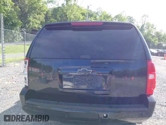 2013 Chevrolet Tahoe Commercial with VIN 1GNLC2E00DR265941, listed as a IAAI auction lot 42289977 with 206,840 mi miles and . Bid and sale history available at DreamBid. Image 15.