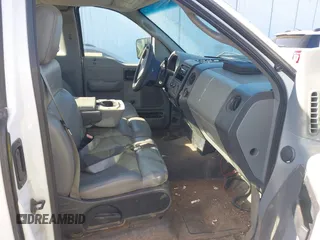 2004 Ford F-150 XL with VIN 1FTRF12W74NC52818, listed as a IAAI auction lot 41807293 with 291,166 mi miles. Bid and sale history available at carsss.com. Image 5.
