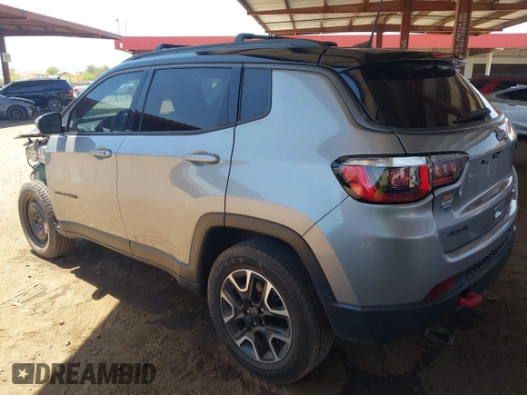 2019 Jeep Compass Trailhawk z VIN 3C4NJDDB1KT812953, wystawiony jako IAAI lot #42178451 z przebiegiem 76 269 mil mil oraz . Historia ofert i sprzedaży dostępna na DreamBid. Obrazek 3.