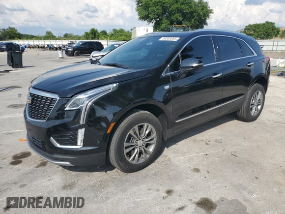 2022 Cadillac XT5 FWD Premium Luxury z VIN 1GYKNCRS7NZ101131, wystawiony jako Copart lot #56365065 z przebiegiem 74 168 mil mil oraz Szkoda całkowita • Salvage title. Historia ofert i sprzedaży dostępna na DreamBid. Obrazek 1.