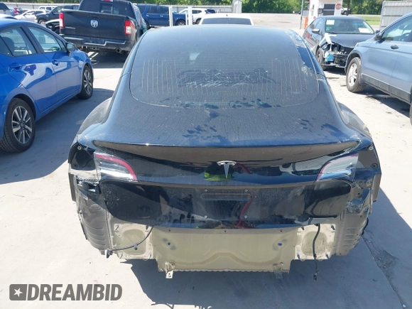 2018 Tesla Model 3 Long Range Battery with VIN 5YJ3E1EA7JF098632, listed as a IAAI auction lot 42002181 with 73,371 mi miles and . Bid and sale history available at DreamBid. Image 6.