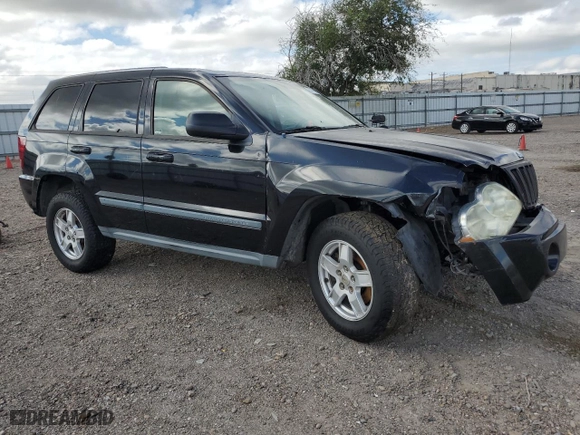 2007 Jeep Grand Cherokee Laredo with VIN 1J8HS48P37C594980, listed as a Copart auction lot 74819394 with 105,904 mi miles and Salvage Title. Bid and sale history available at carsss.com. Image 4.