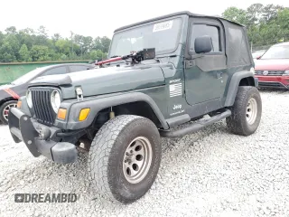 2003 Jeep Wrangler Sport z VIN 1J4FA49S03P330858, wystawiony jako Copart lot #59519085 z przebiegiem Nie podano mil oraz Szkoda całkowita • Salvage title. Historia ofert i sprzedaży dostępna na DreamBid. Obrazek 1.