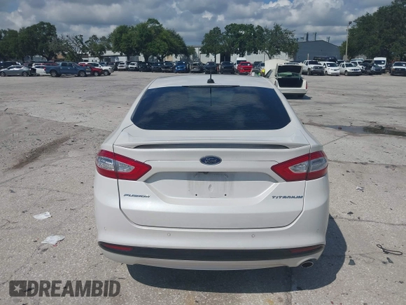 2013 Ford Fusion Titanium with VIN 3FA6P0SU0DR239890, listed as a IAAI auction lot 42745530 with 129,458 mi miles and . Bid and sale history available at DreamBid. Image 16.
