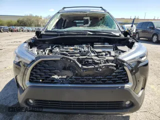 2024 Toyota Corolla Cross XLE с VIN 7MUDAAAG9RV100890, выставлен на аукционе Copart как лот 55168555 с пробегом Не указан миль и Списание • Salvage title. История ставок и продаж доступна на DreamBid. Изображение 5.