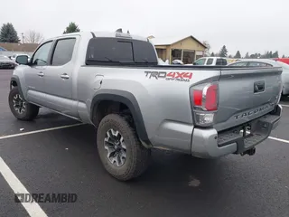 2023 Toyota Tacoma SR5 z VIN 3TMDZ5BN6PM156824, wystawiony jako IAAI lot #41031932 z przebiegiem 14 226 mil mil oraz . Historia ofert i sprzedaży dostępna na DreamBid. Obrazek 3.