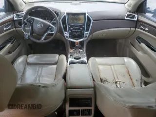 2015 Cadillac SRX Performance Collection with VIN 3GYFNCE38FS571733, listed as a Copart auction lot 54946215 with 147,343 mi miles and Salvage title. Bid and sale history available at DreamBid. Image 8.