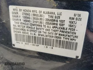 2006 Honda Odyssey EX-L z VIN 5FNRL38706B128265, wystawiony jako Copart lot #58715415 z przebiegiem 377 656 mil mil oraz Szkoda całkowita • Salvage title. Historia ofert i sprzedaży dostępna na DreamBid. Obrazek 13.
