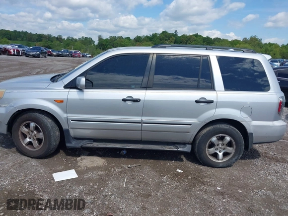 2006 Honda Pilot EX-L with VIN 2HKYF18596H563583, listed as a IAAI auction lot 42183326 with 181,665 mi miles and . Bid and sale history available at DreamBid. Image 14.
