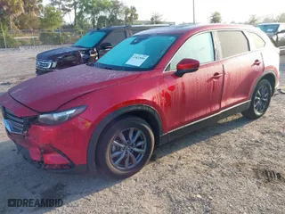 2023 Mazda CX-9 Touring with VIN JM3TCBCYXP0648805, listed as a IAAI auction lot 41822899 with 93,015 mi miles. Bid and sale history available at carsss.com. Image 2.
