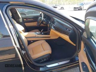 2015 BMW 7 Series 750Li with VIN WBAYE8C50FD781384, listed as a IAAI auction lot 42049829 with 128,087 mi miles and . Bid and sale history available at carsss.com. Image 5.