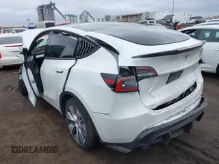 2023 Tesla Model Y Long Range with VIN 7SAYGDEE0PA112870, listed as a IAAI auction lot 41727017 with 24,246 mi miles. Bid and sale history available at carsss.com. Image 3.
