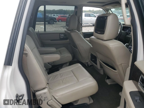 2015 Lincoln Navigator z VIN 5LMJJ3HT1FEJ03496, wystawiony jako Copart lot #77615394 z przebiegiem 118 636 mil mil oraz Szkoda całkowita • Salvage title. Historia ofert i sprzedaży dostępna na DreamBid. Obrazek 11.