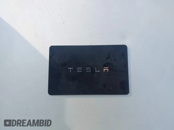 2023 Tesla Model Y Long Range with VIN 7SAYGDEE7PA196038, listed as a IAAI auction lot 41459601 with 16,489 mi miles and . Bid and sale history available at DreamBid. Image 11.