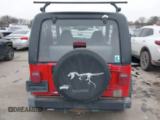 1998 Jeep Wrangler SE with VIN 1J4FY29P2WP791317, listed as a IAAI auction lot 41748523 with 169,052 mi miles. Bid and sale history available at carsss.com. Image 16.