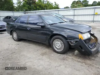 1989 Ford Taurus z VIN 1FABP54Y5KA202935, wystawiony jako Copart lot #59355304 z przebiegiem 67 510 mil mil oraz Szkoda całkowita • Salvage title. Historia ofert i sprzedaży dostępna na DreamBid. Obrazek 4.
