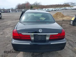 2005 Mercury Grand Marquis LS Premium z VIN 2MEFM75W65X671622, wystawiony jako IAAI lot #41958287 z przebiegiem 154 662 mil mil oraz . Historia ofert i sprzedaży dostępna na DreamBid. Obrazek 16.