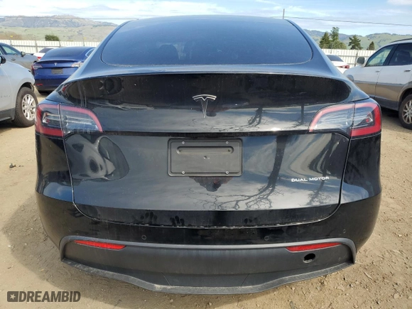 2022 Tesla Model Y Long Range with VIN 7SAYGDEE2NF575433, listed as a Copart auction lot 47576175 with 53,642 mi miles and Salvage Title. Bid and sale history available at carsss.com. Image 6.