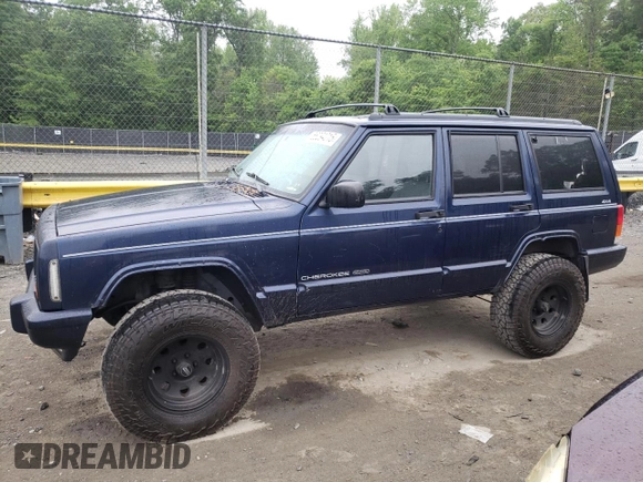 1997 Jeep Cherokee Country with VIN 1J4FJ78S4VL589852, listed as a Copart auction lot 56294015 with 189,530 mi miles and Salvage title. Bid and sale history available at DreamBid. Image 1.