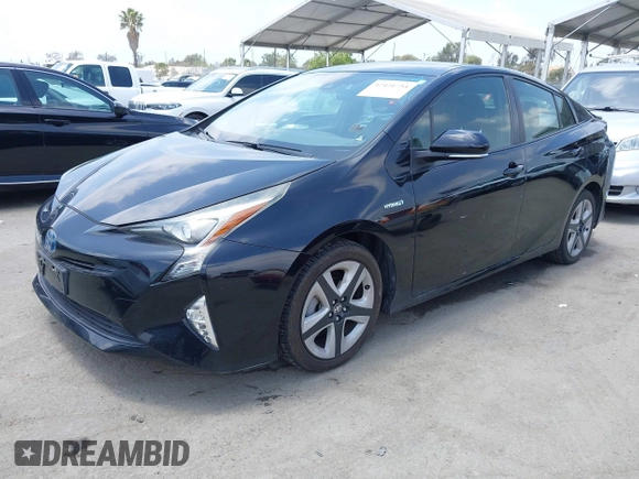 2017 Toyota Prius Two with VIN JTDKARFUXH3041668, listed as a IAAI auction lot 42421754 with 57,677 mi miles and . Bid and sale history available at DreamBid. Image 2.