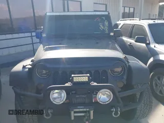 2011 Jeep Wrangler Rubicon with VIN 1J4BA6D10BL628180, listed as a IAAI auction lot 41711065 with 155,940 mi miles and . Bid and sale history available at carsss.com. Image 12.