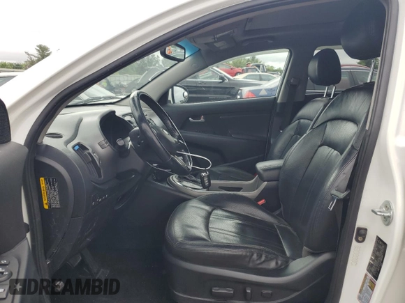 2015 Kia Sportage EX with VIN KNDPCCAC9F7692369, listed as a Copart auction lot 58847895 with 250,000 mi miles and Salvage title. Bid and sale history available at DreamBid. Image 7.