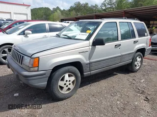 1994 Jeep Grand Cherokee Laredo with VIN 1J4GZ58Y0RC200247, listed as a IAAI auction lot 41781078 with 217,698 mi miles. Bid and sale history available at carsss.com. Image 2.