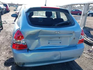 2007 Hyundai Accent SE with VIN KMHCN36CX7U031496, listed as a IAAI auction lot 41811183 with 201,740 mi miles. Bid and sale history available at carsss.com. Image 6.