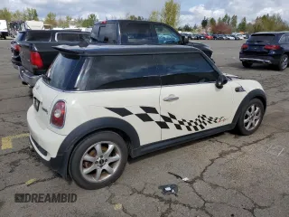 2009 MINI Hardtop S with VIN WMWMF73569TW84934, listed as a Copart auction lot 51344975 with 123,929 mi miles and Salvage title. Bid and sale history available at DreamBid. Image 3.