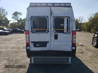 2022 Ram ProMaster Cargo with VIN 3C6MRVHG0NE140027, listed as a Copart auction lot 77065884 with 18,876 mi miles and Salvage Title. Bid and sale history available at DreamBid. Image 6.