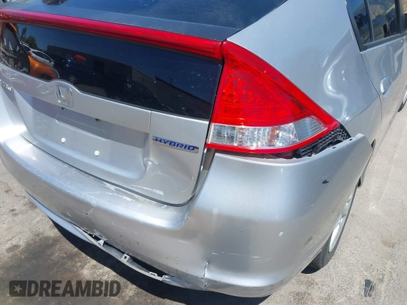 2010 Honda Insight EX with VIN JHMZE2H74AS041533, listed as a IAAI auction lot 42675766 with 203,357 mi miles and . Bid and sale history available at DreamBid. Image 6.