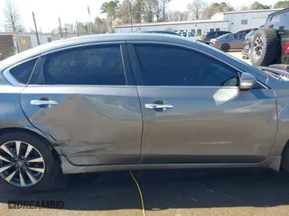 2016 Nissan Altima 2.5 SL with VIN 1N4AL3AP5GC276665, listed as a IAAI auction lot 41753123 with 131,679 mi miles. Bid and sale history available at carsss.com. Image 13.