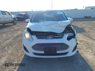 2013 Ford C-Max SE z VIN 1FADP5AU8DL556370, wystawiony jako IAAI lot #41276760 z przebiegiem 135 618 mil mil oraz . Historia ofert i sprzedaży dostępna na DreamBid. Obrazek 6.