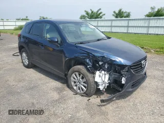 2016 Mazda CX-5 Touring с VIN JM3KE4CY8G0686101, выставлен на аукционе Copart как лот 60361215 с пробегом 126 804 миль миль и На запчасти • Non repairable. История ставок и продаж доступна на DreamBid. Изображение 4.