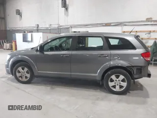 2013 Dodge Journey American Value with VIN 3C4PDCAB1DT508765, listed as a IAAI auction lot 42149373 with 159,113 mi miles and . Bid and sale history available at DreamBid. Image 14.
