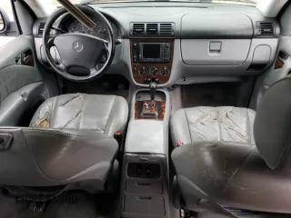 2000 Mercedes-Benz M-Class with VIN 4JGAB54E5YA202352, listed as a Copart auction lot 73734624 with 295,895 mi miles and Salvage Title. Bid and sale history available at carsss.com. Image 8.
